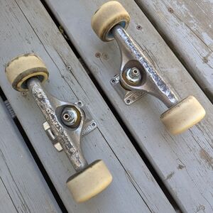 Set of pro skate board trucks, wheels and bearings
